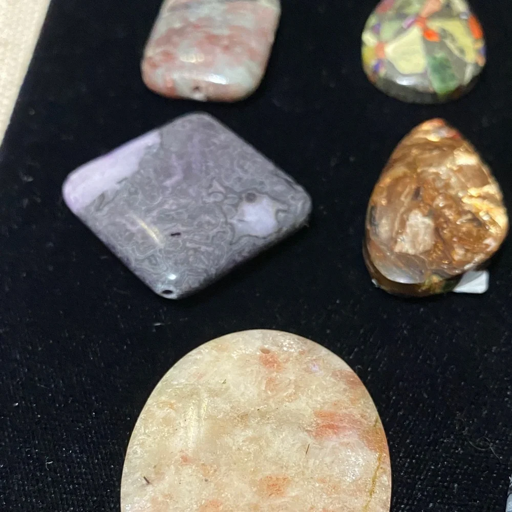 Eight assorted natural gemstones pendants for jewelry makers